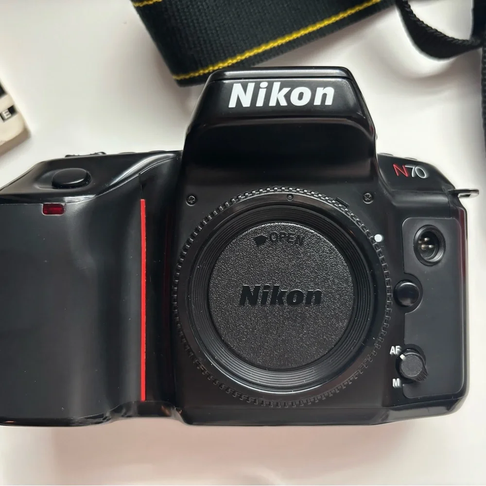Nikon N70 SLR Camera Body with Branded Strap and Accessories